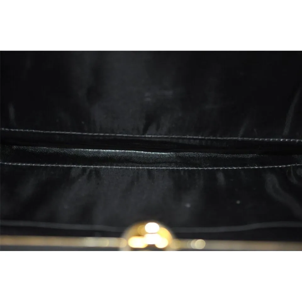 1960's Gucci mod black silk interlocking GG clutch purse
