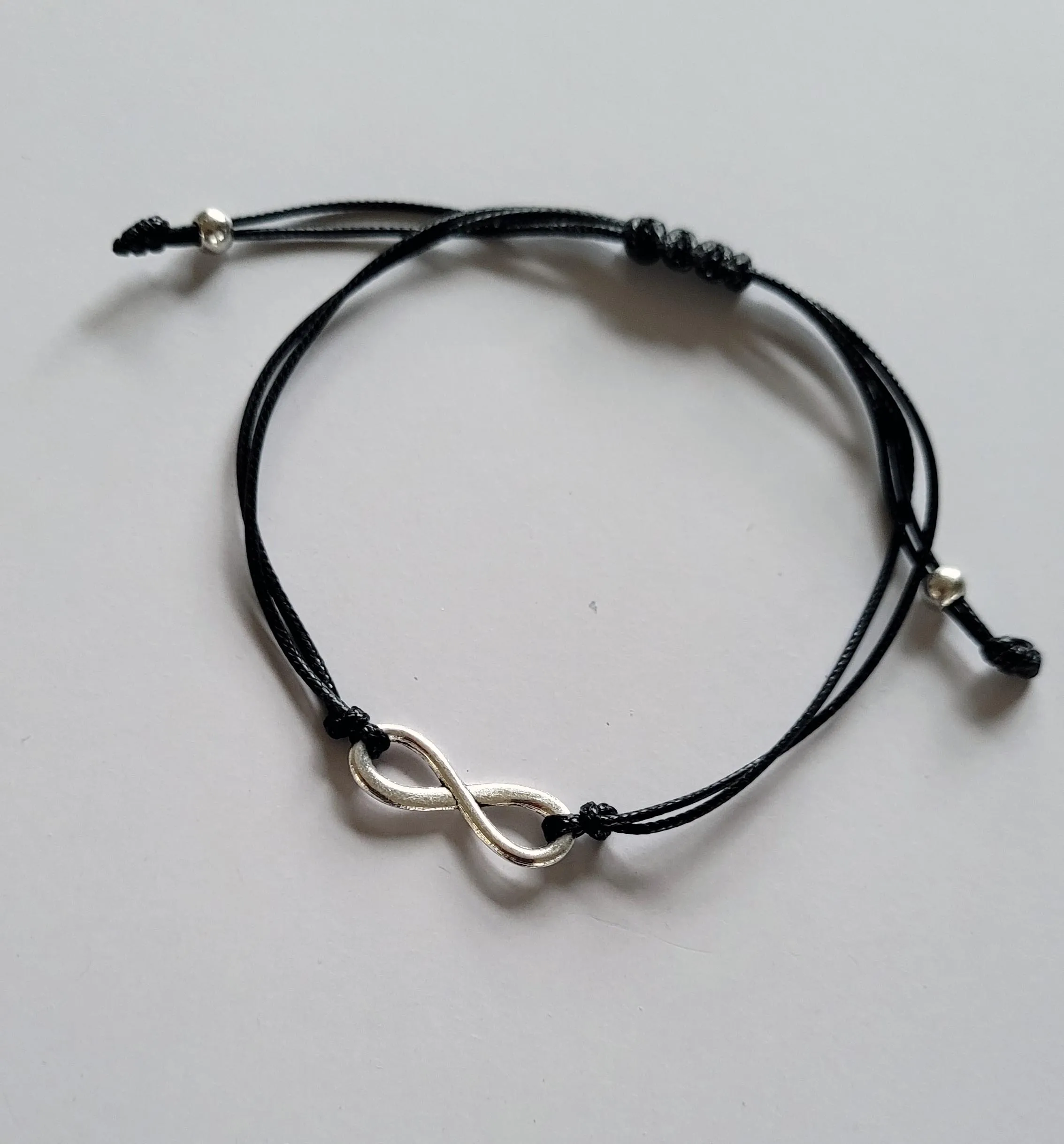 Adjustable 2 strand Infinity Bracelets in red or black