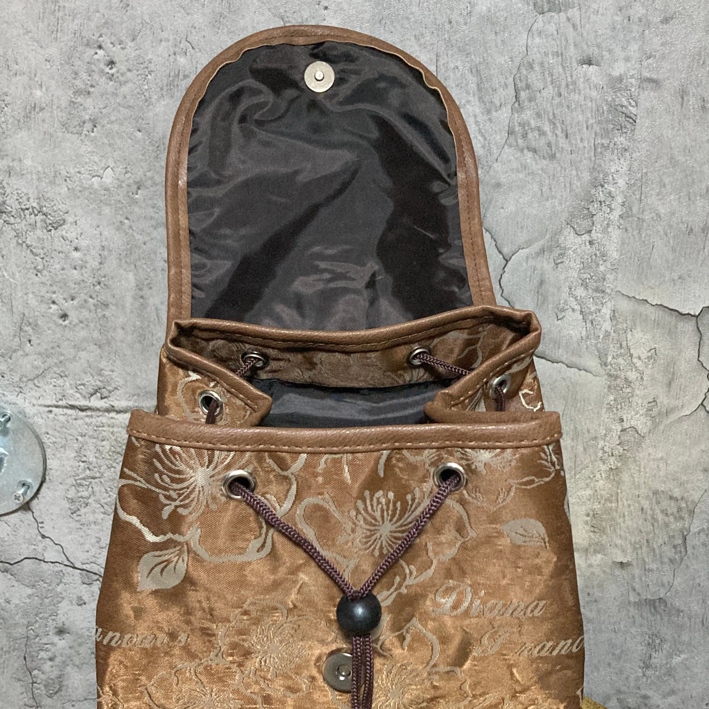 brown hibiscus mini backpack