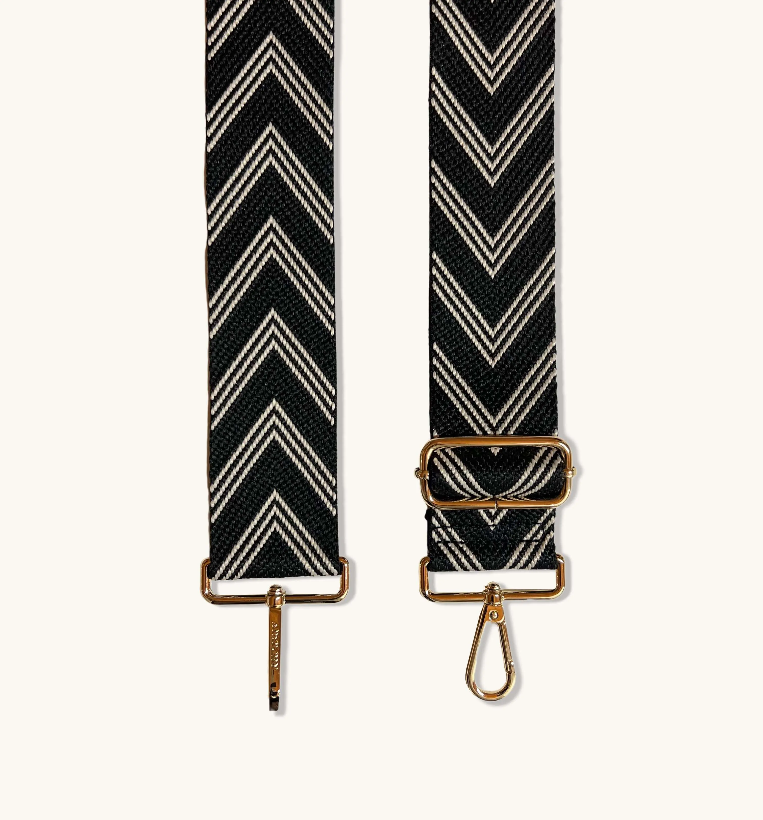 The Tassel Black Leather Crossbody Bag With Black & Stone Arrow Strap