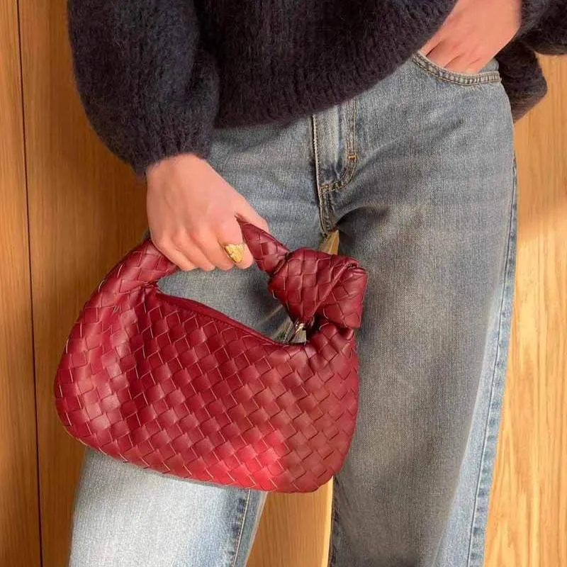 Woven Mini Satchel Bag Made from Vegan Leather with Elegant Design and Silver Accents