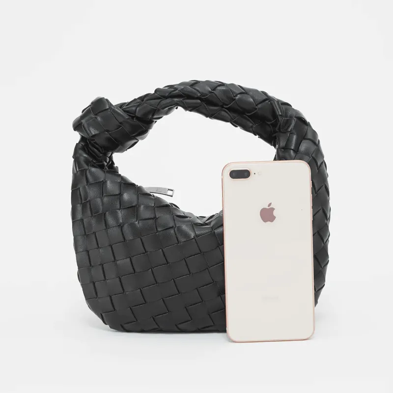 Woven Mini Satchel Bag Made from Vegan Leather with Elegant Design and Silver Accents