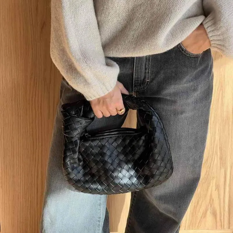 Woven Mini Satchel Bag Made from Vegan Leather with Elegant Design and Silver Accents